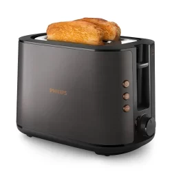 Philips 5000 Series Toaster HD2650/31 on a kitchen counter, highlighting its sleek design, wide slots, and user-friendly controls for perfect toasting.